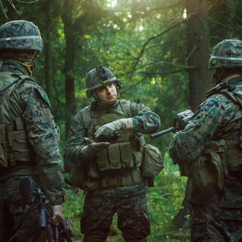 United States marines standing around in a circle