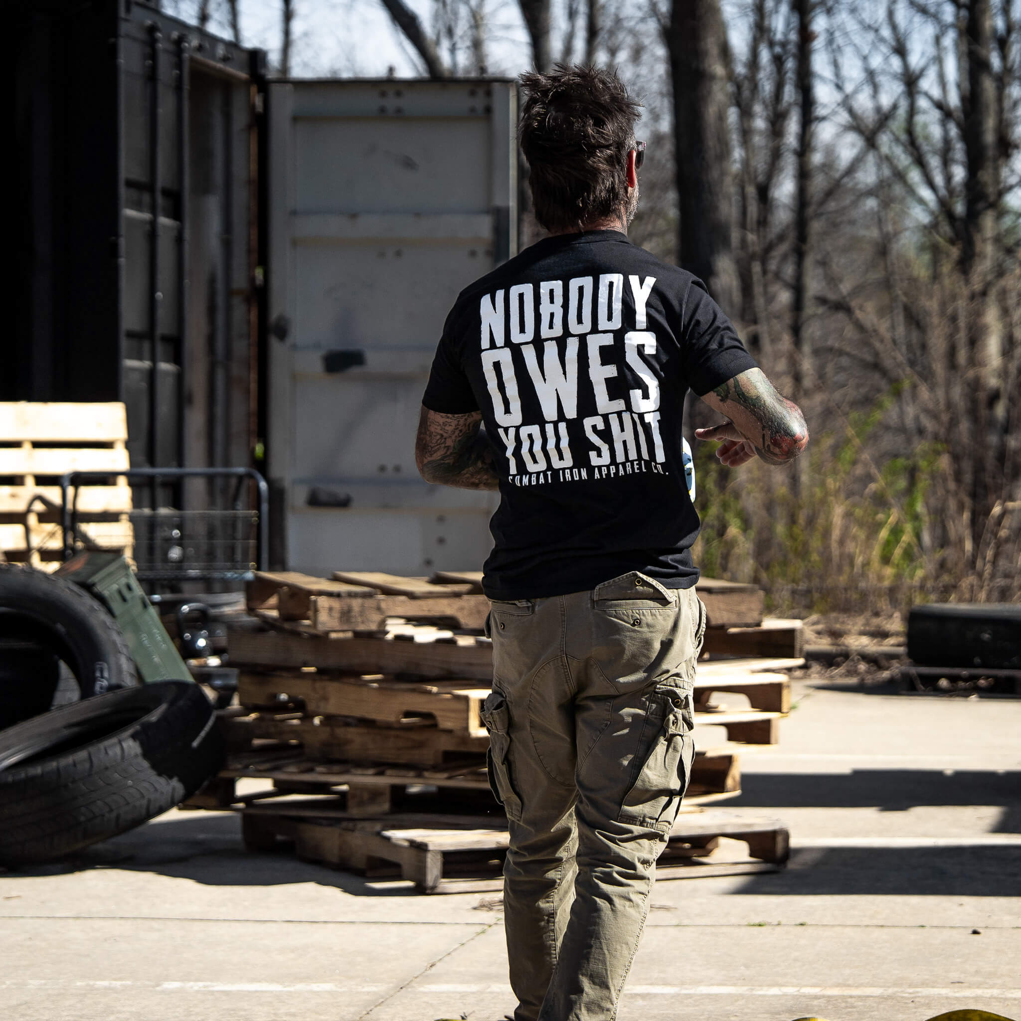 NOBODY OWES YOU Men's T-Shirt