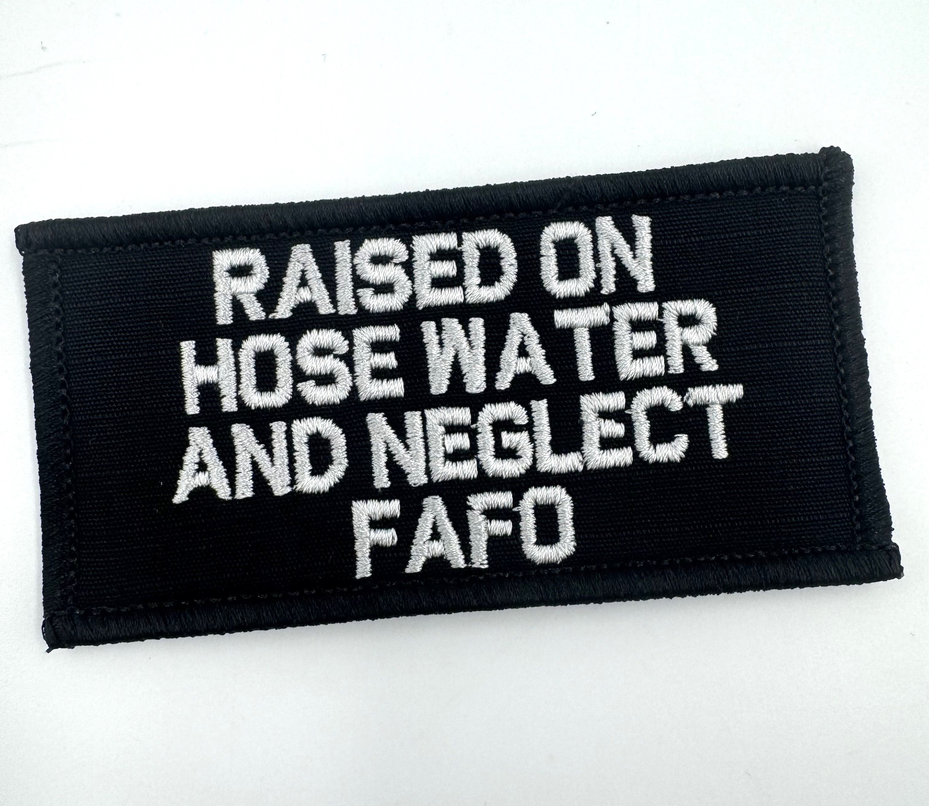 “RAISED ON HOSE WATER AND NEGLECT FAFO” TACTICAL MORALE PATCH