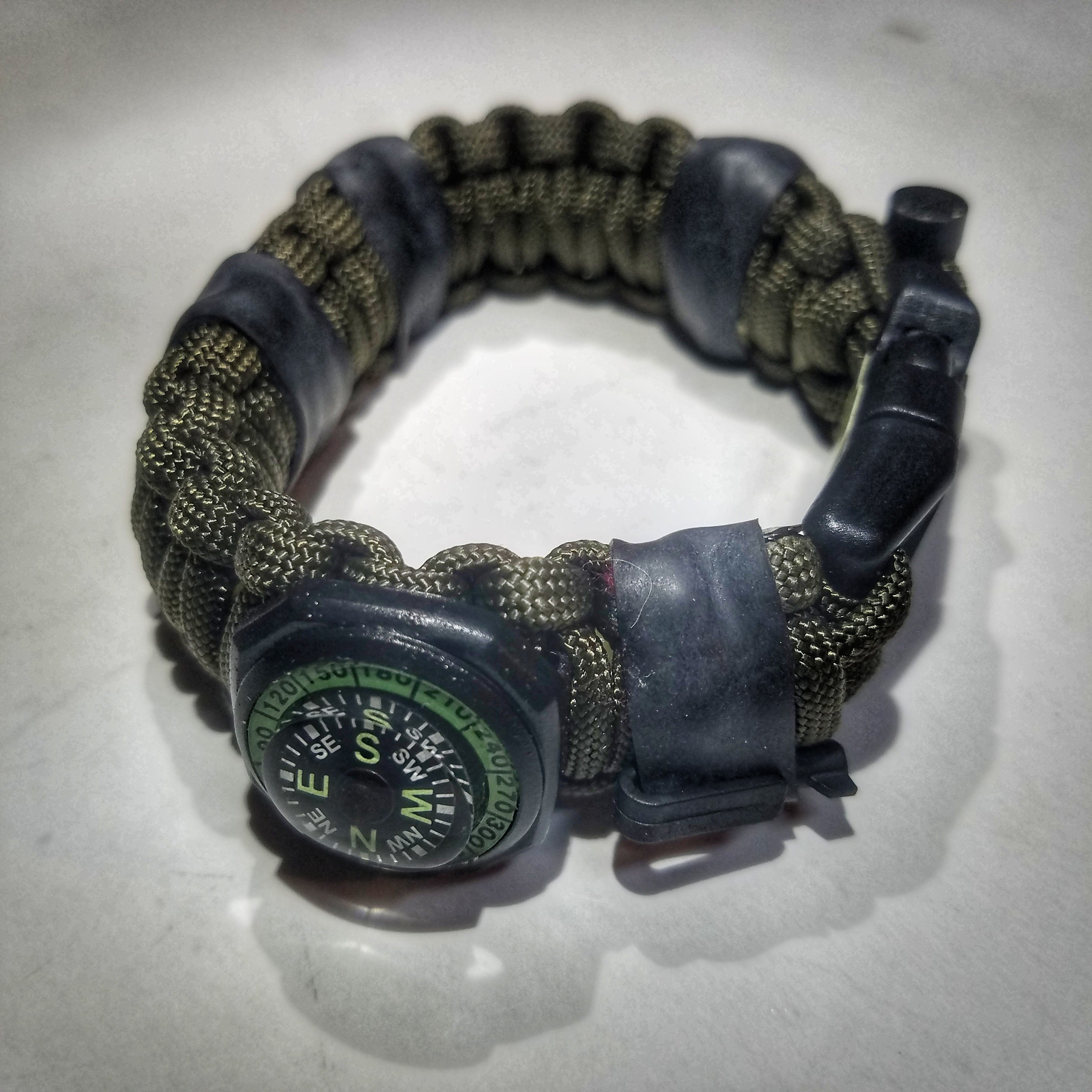 The Escape Evade Pathfinder: Military & Tactical Strap w/ SERE kit, Compass, Kevlar Saw, Cuff Key.