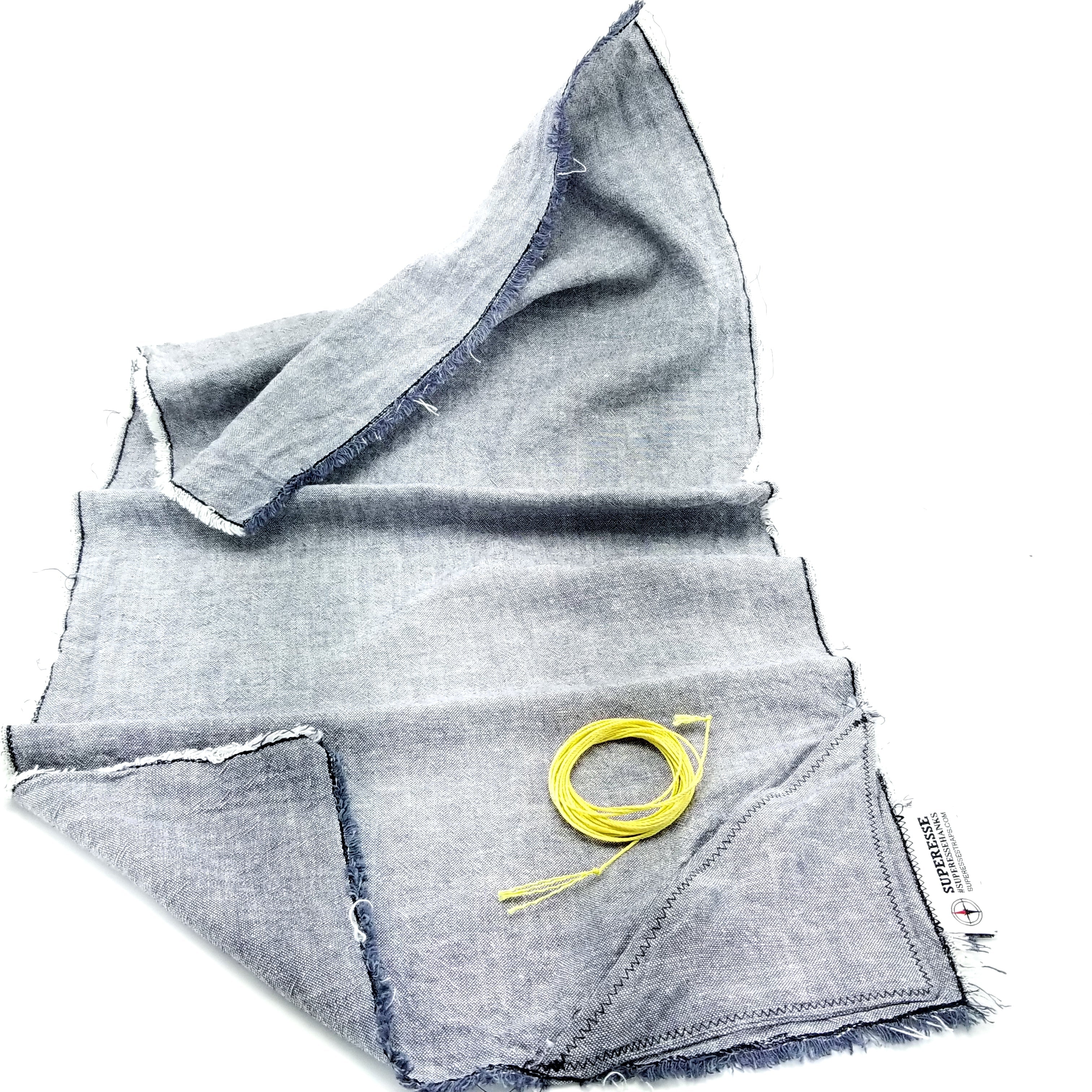 Saw Shemagh: Firestarter sewn button, built-in Kevlar Utility Saw, Fire Tinder border.