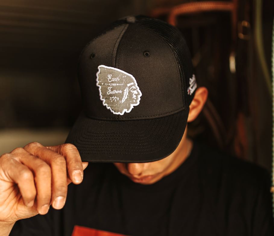 "EARN YOUR FEATHERS" TRUCKER HAT