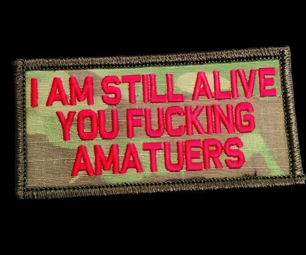 "I AM STILL ALIVE YOU FUCKING AMATEURS" TACTICAL MORALE PATCH - CAMO