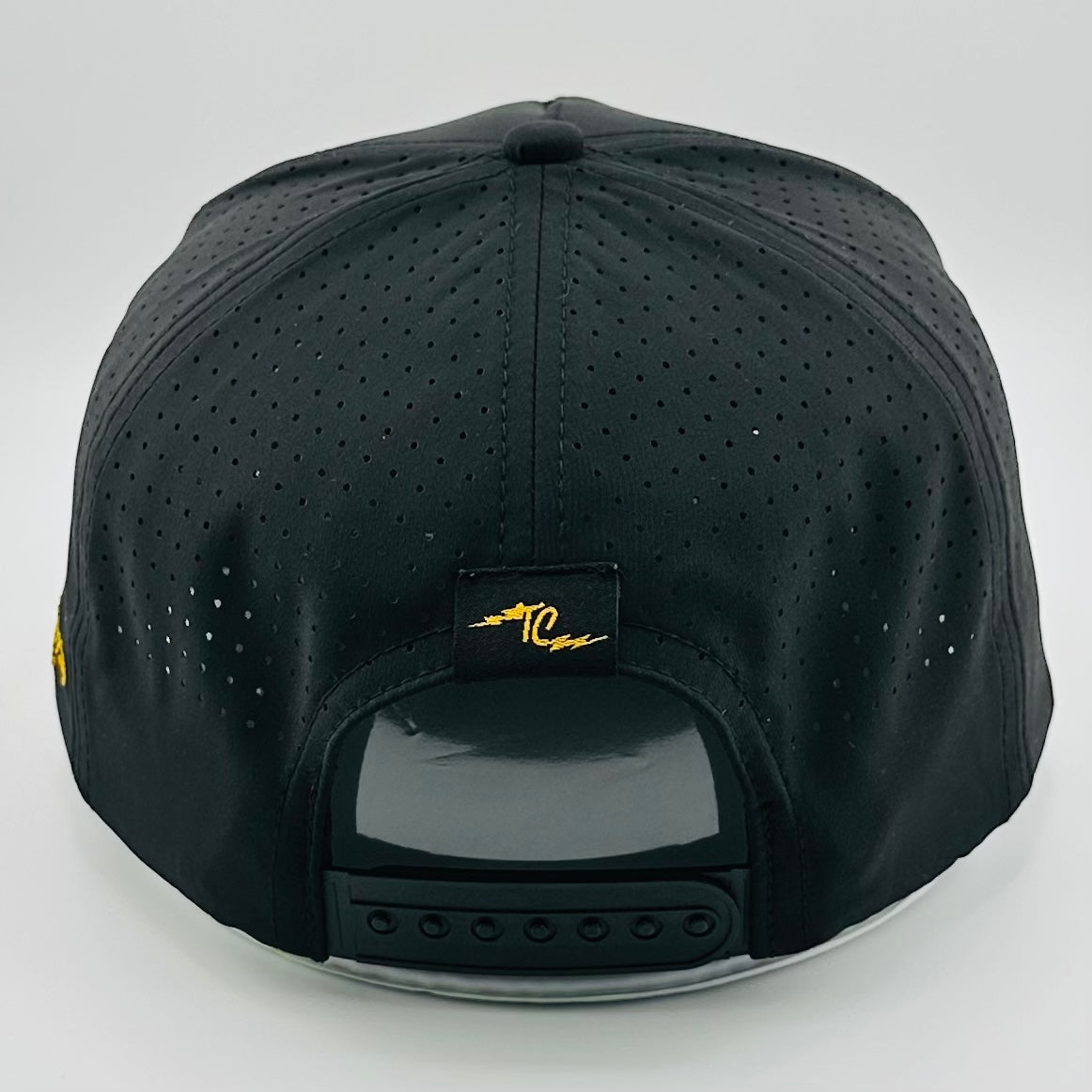 TRENT COWIE "SUPPORT INDEPENDENCE" PERFORMANCE HAT (BLACK & GOLD)