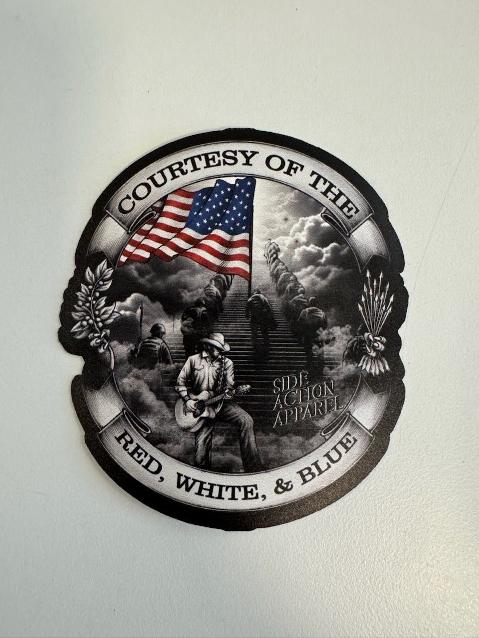 Courtesy of the Red, White and Blue - Sticker