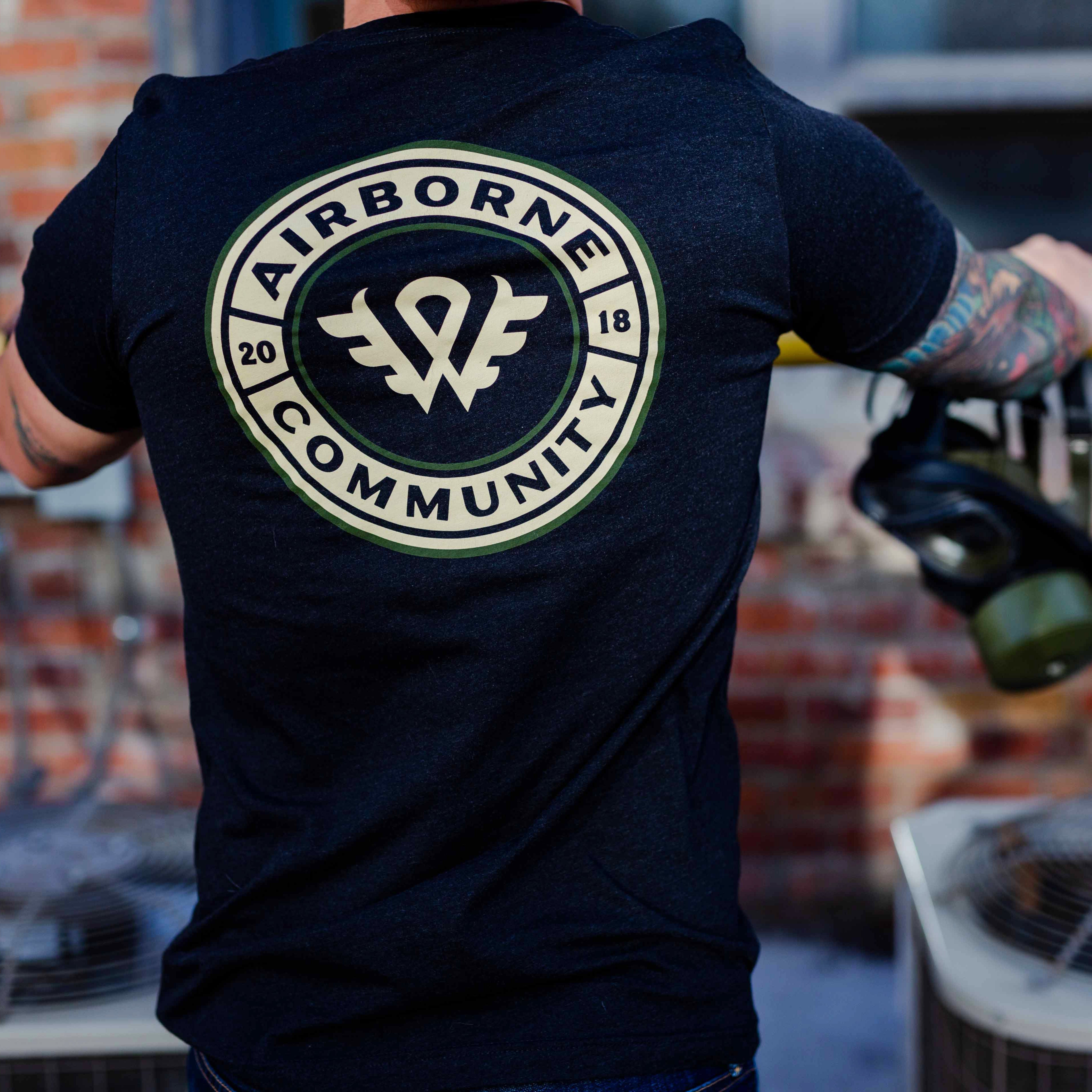 Community Badge Athletic Shirt