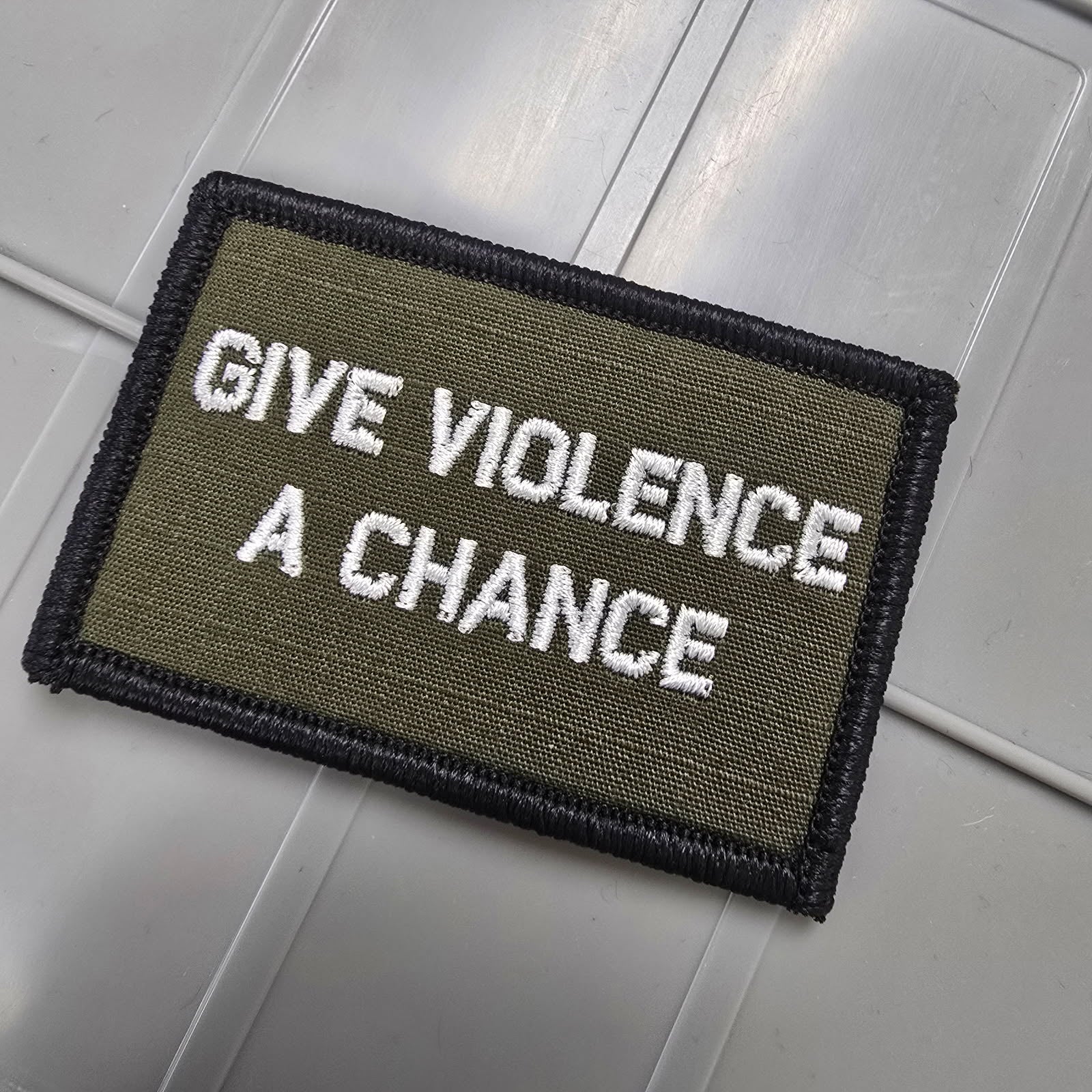 As Seen on Socials - Give Violence A Chance - 2x3 Patch - Olive Drab w/White