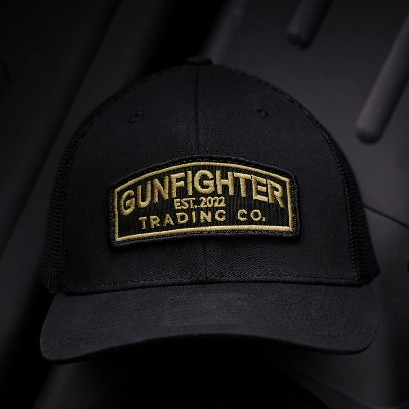 GUNFIGHTER PATCH TRUCKER HAT