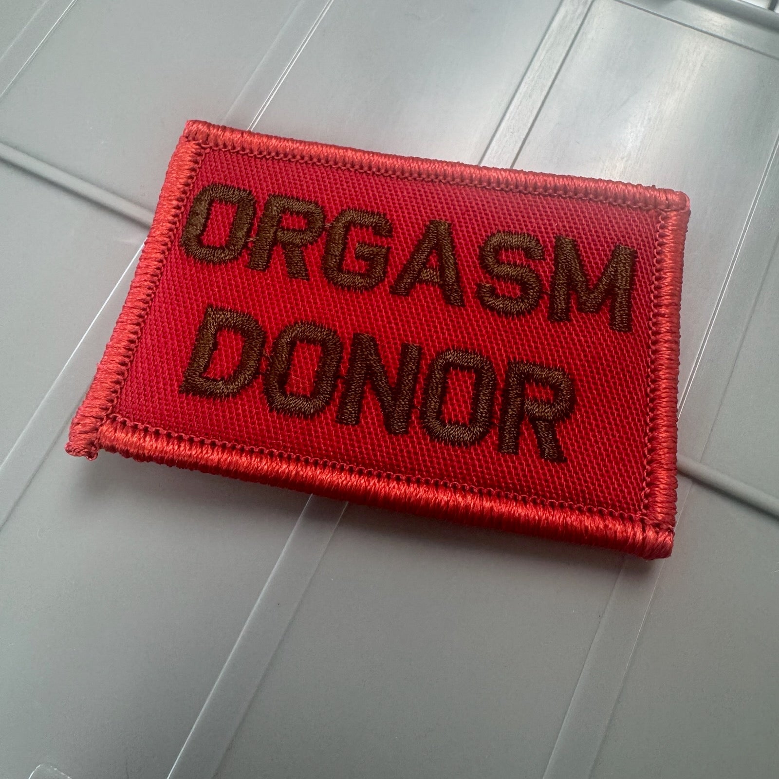 As Seen on Socials - Orgasm Donor - Red w/Black - 2x3