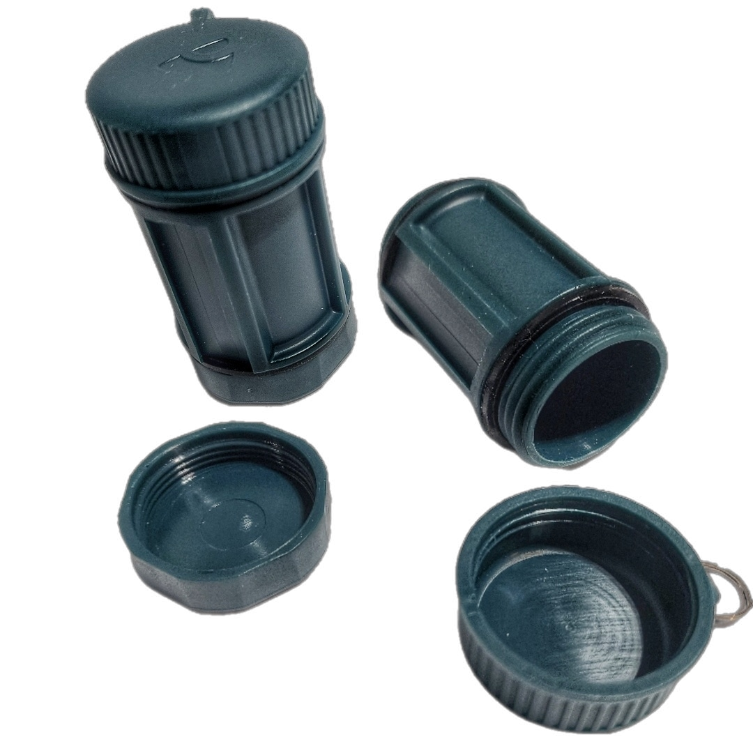 Drop Shell - Polymer Capsule filled with Survival, Escape, and First-Aid Supplies.
