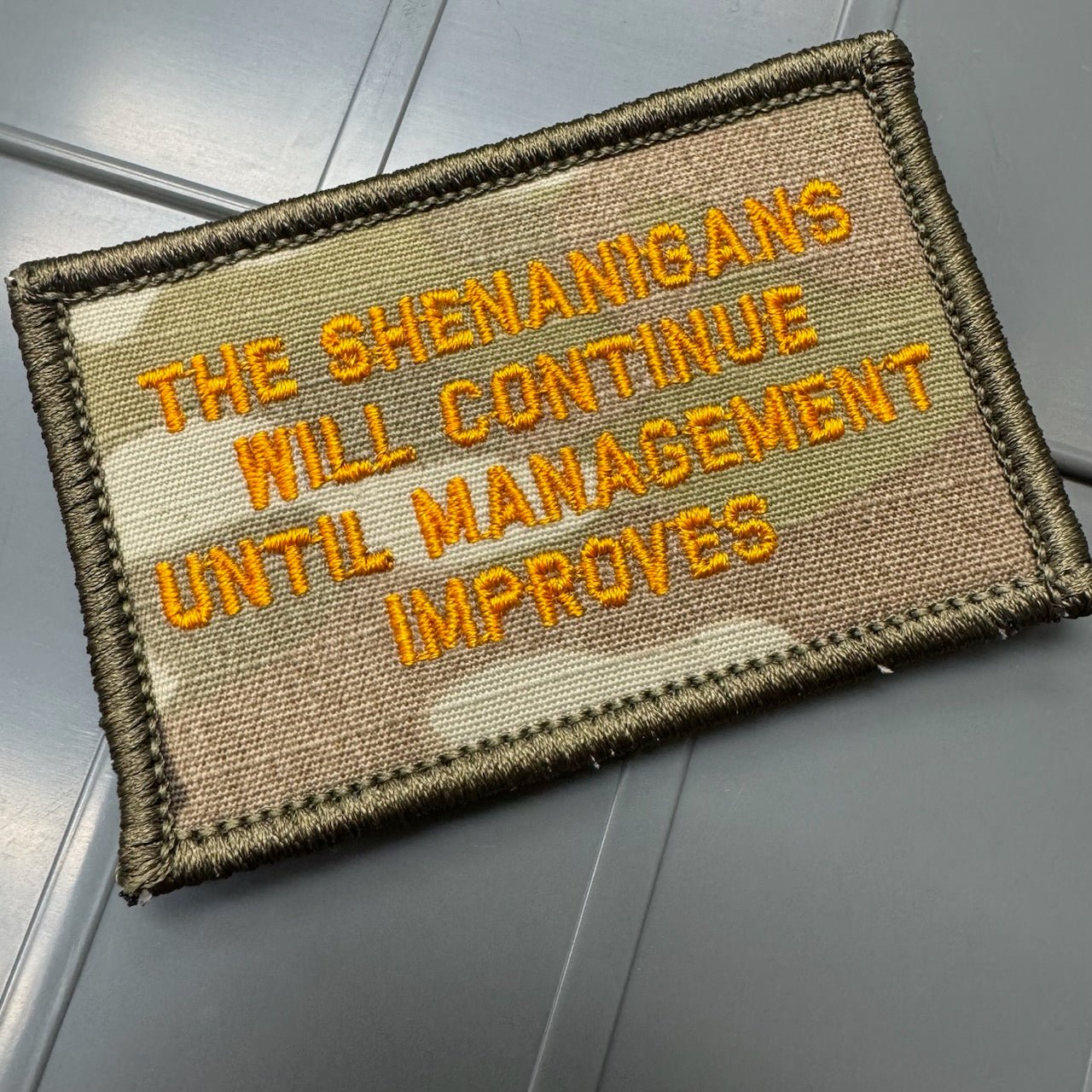 As Seen on Socials - The Shenanigans Will Continue Until Management Improves - 2x3 Patch - Multicam w/Orange